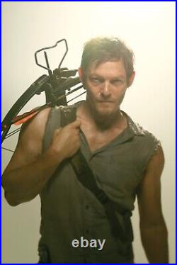 The Walking Dead Daryl Dixon Orange Arrow SIGNED BY NORMAN REEDUS -COA & PICTURE