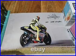 Valentino Rossi signed 2001 world Champion photo. Limited 3/46. COA